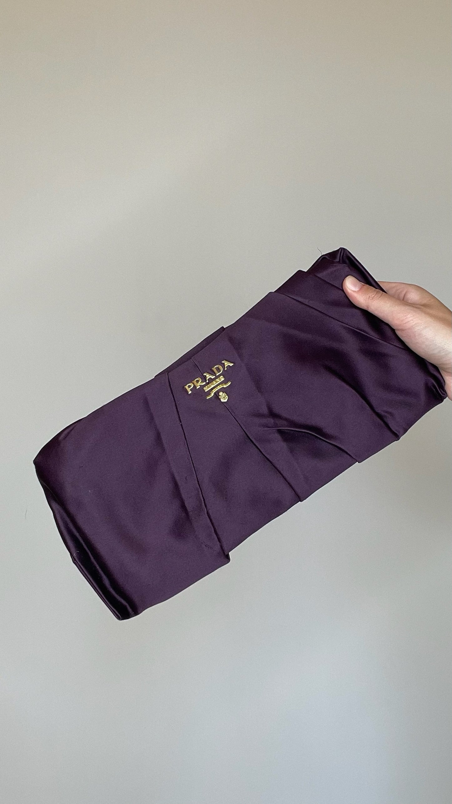 Purple Clutch Logo Clutch